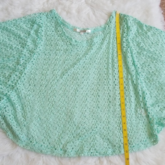 La Mode 22 knitted greencape top. - Picture 8 of 8